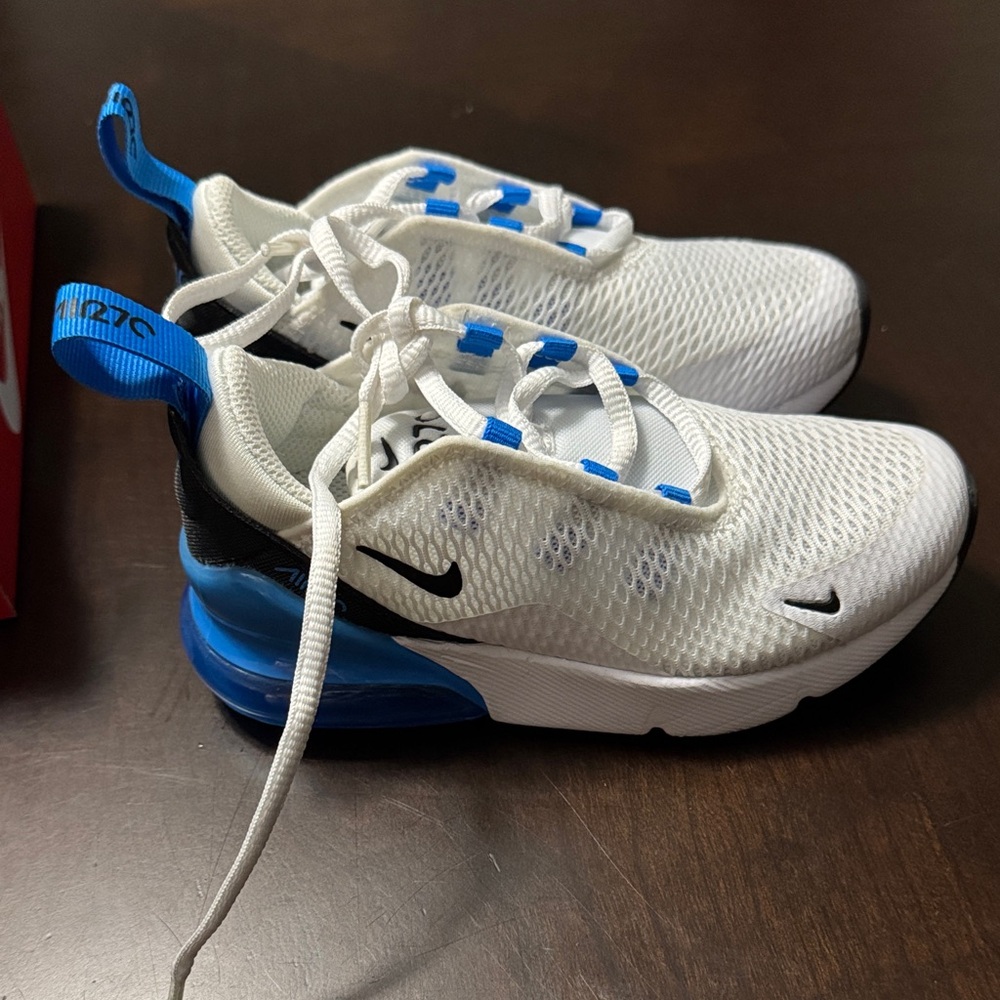 Nike Kids White Sneakers with Blue and Black Highlights